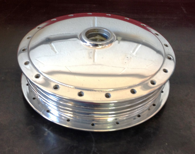 Norton wheel building, hub overhauls and polishing for cafe racers
